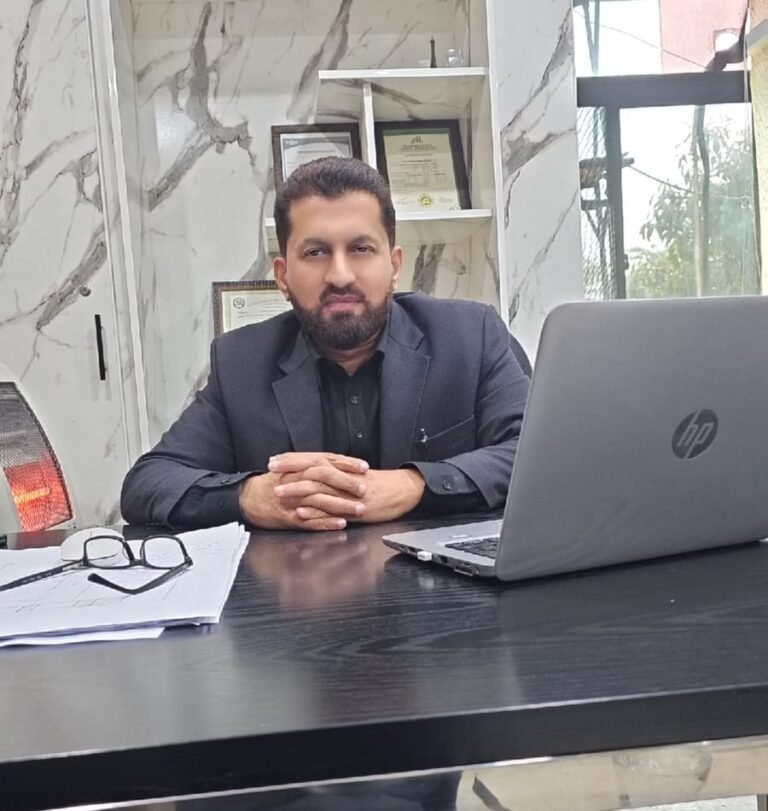 Person sitting at a desk.